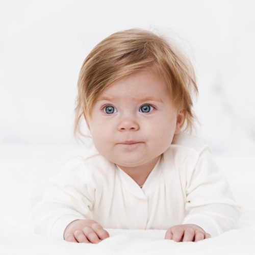 baby-looking-away-while-posing